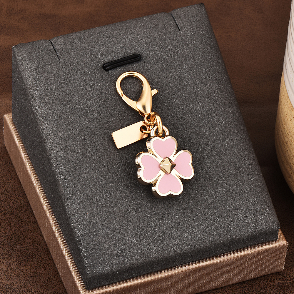 Luxury car keychain bag charm accessories – colorful bear, cherry, four-leaf clover, butterfly – wholesale schoolbag ornaments
