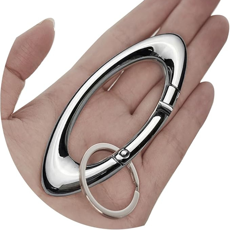 Cross-border five-pointed star metal hiking buckle star keychain oval zinc alloy press spring buckle bag pendant