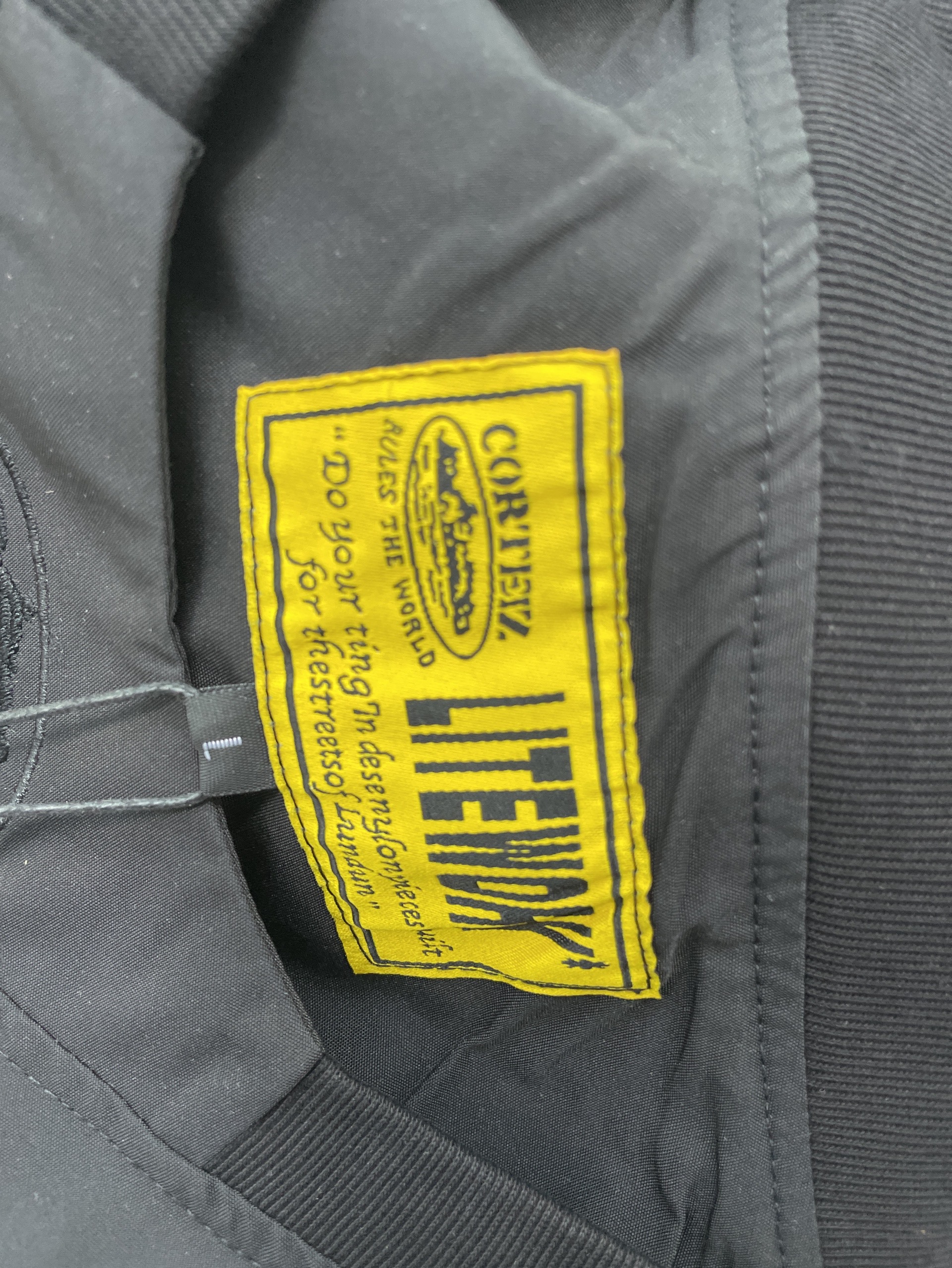 Yellow star shield white string back oval island four color jacket 33110503 2