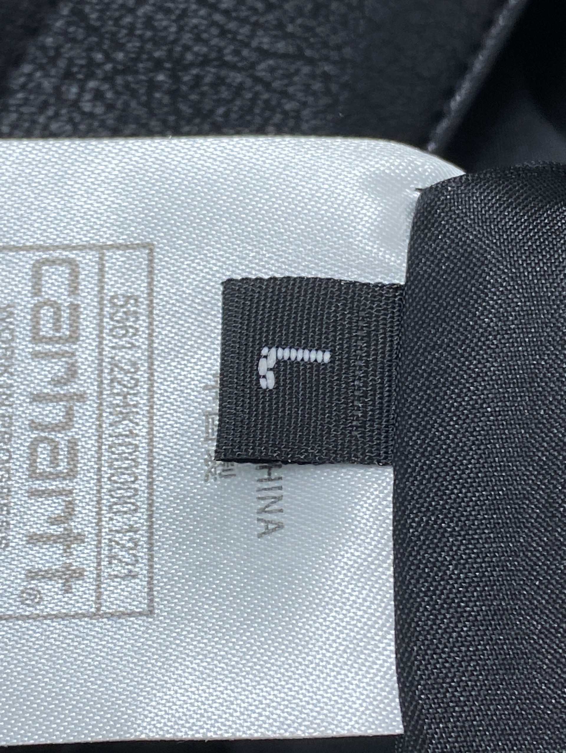 Black spiral under the left horizontal zipper black lapel jacket 44121148 2