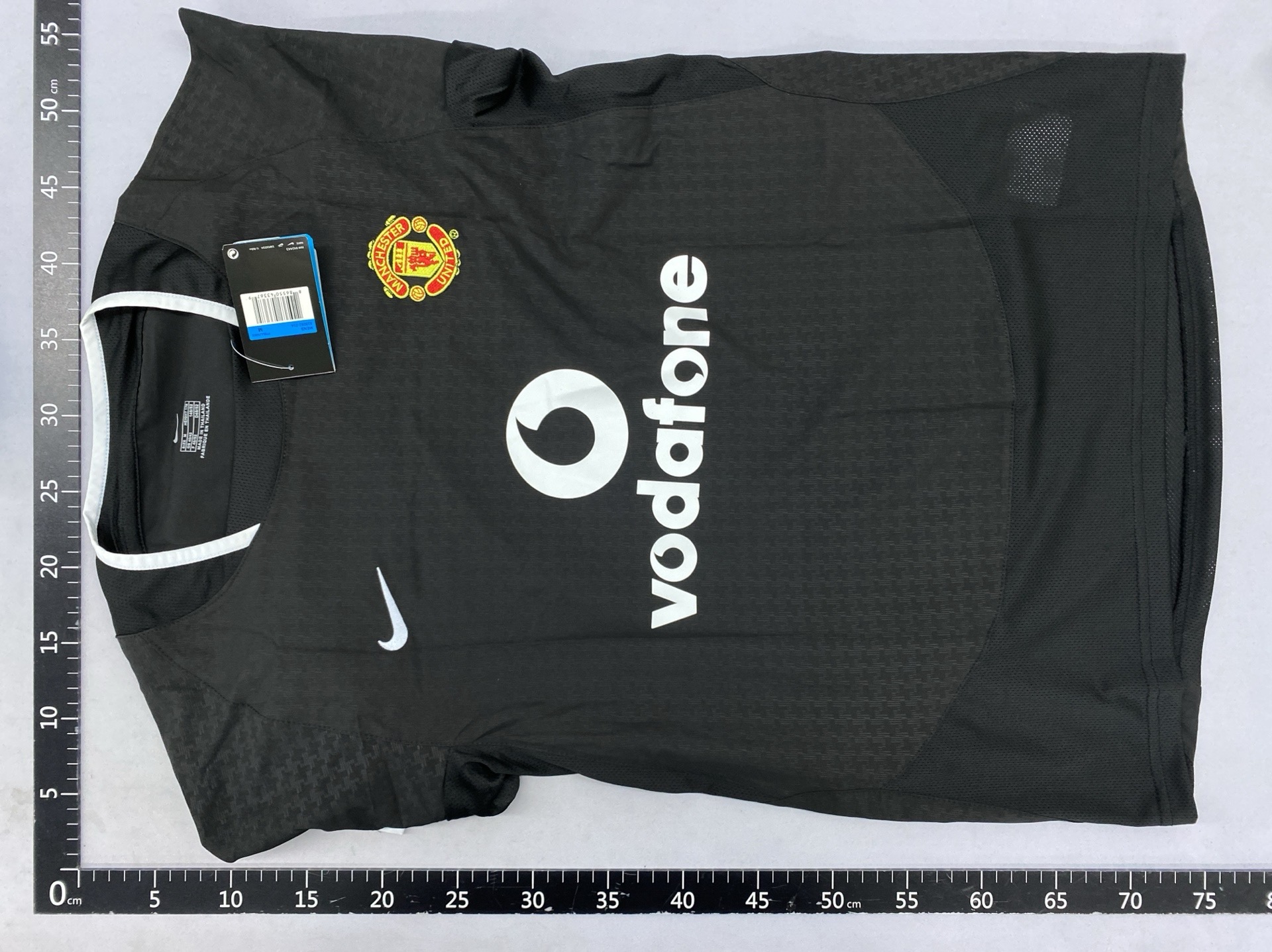 Factory direct: retro long-sleeve real madrid & manchester united jerseys – featuring raúl, solskjaer, guti, and xavi 4